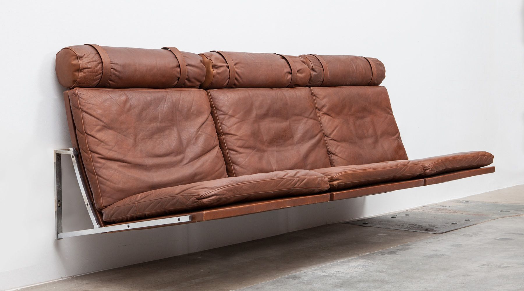 wall mounted sofa by Fabricius / Kastholm Frank Landau