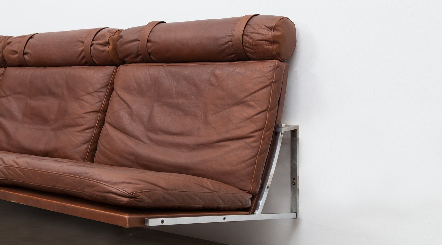 wall mounted sofa by Fabricius / Kastholm Frank Landau