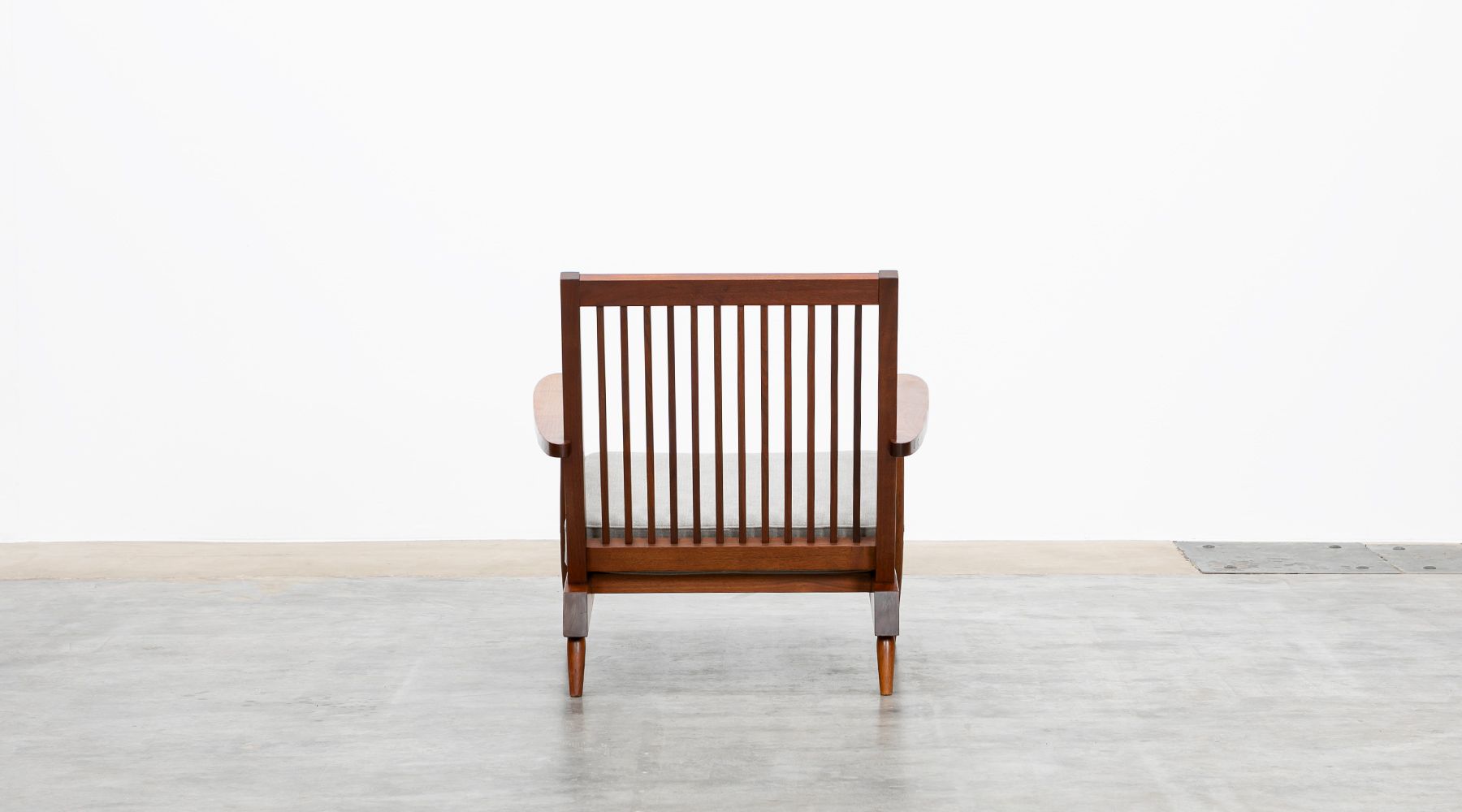 armchair with ottoman by Nakashima Frank Landau