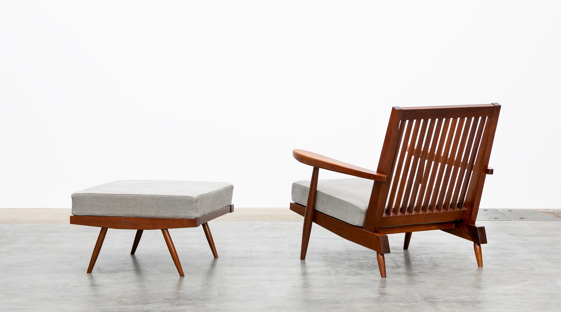 armchair with ottoman by Nakashima Frank Landau